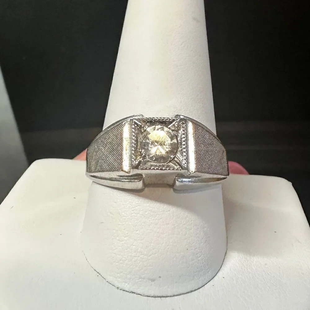 Men’s size 11, sterling silver and 5mm round cut‎ cubic zirconia solitaire ring!